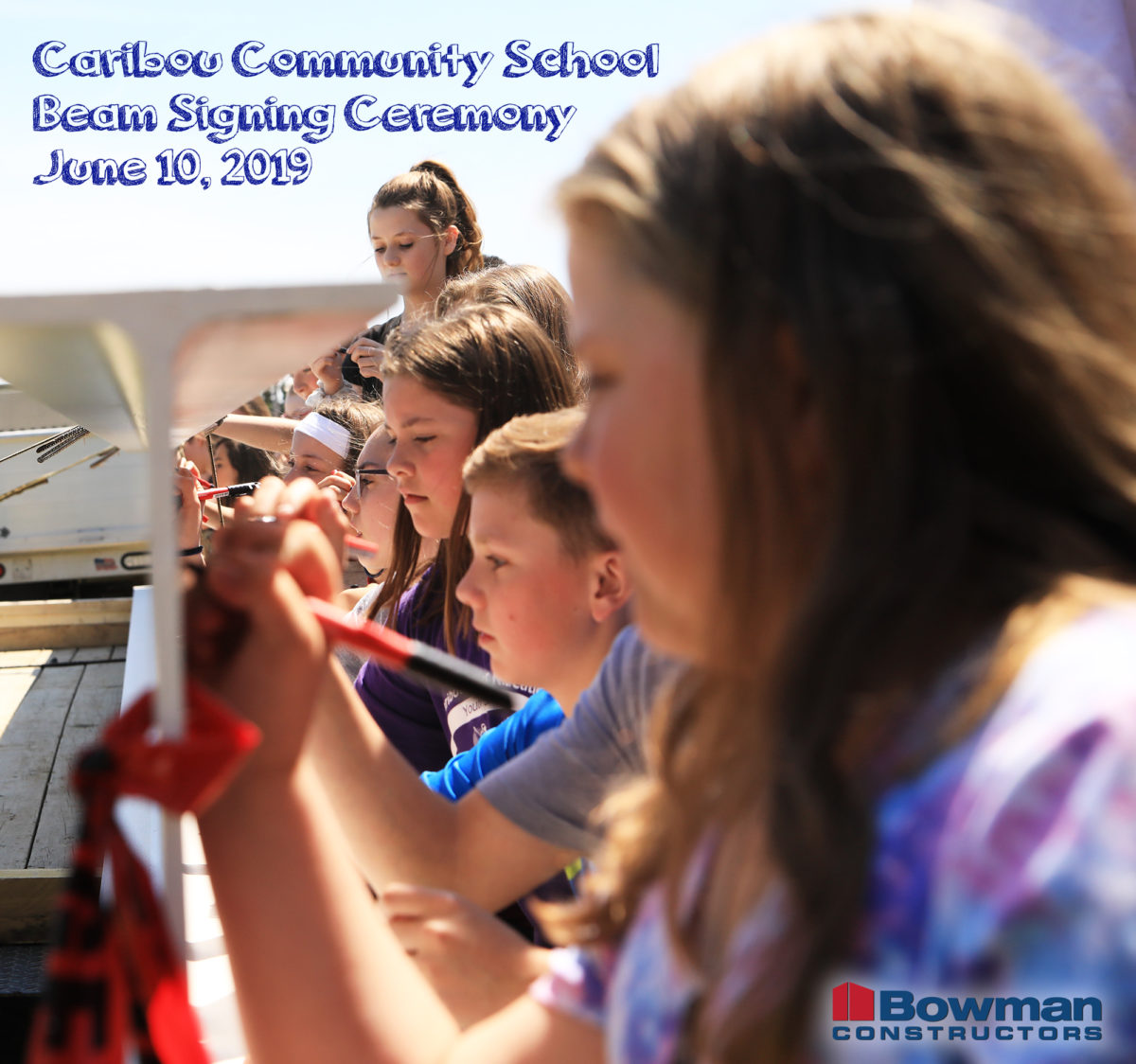 photo graphic of caribou community school beam signing ceremony june 10, 2019 students signing beam
