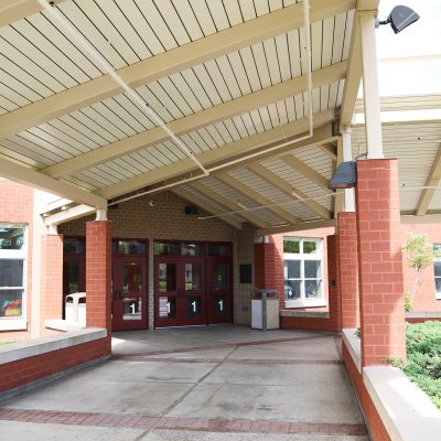 external photo of walkway at ashland school building