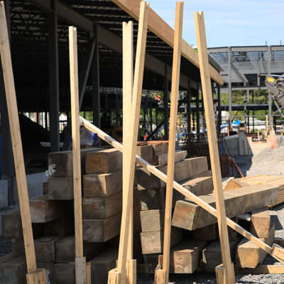 photo of wood beams at construction site for caribou community school
